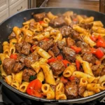 Pepper Steak Pasta in a black pan